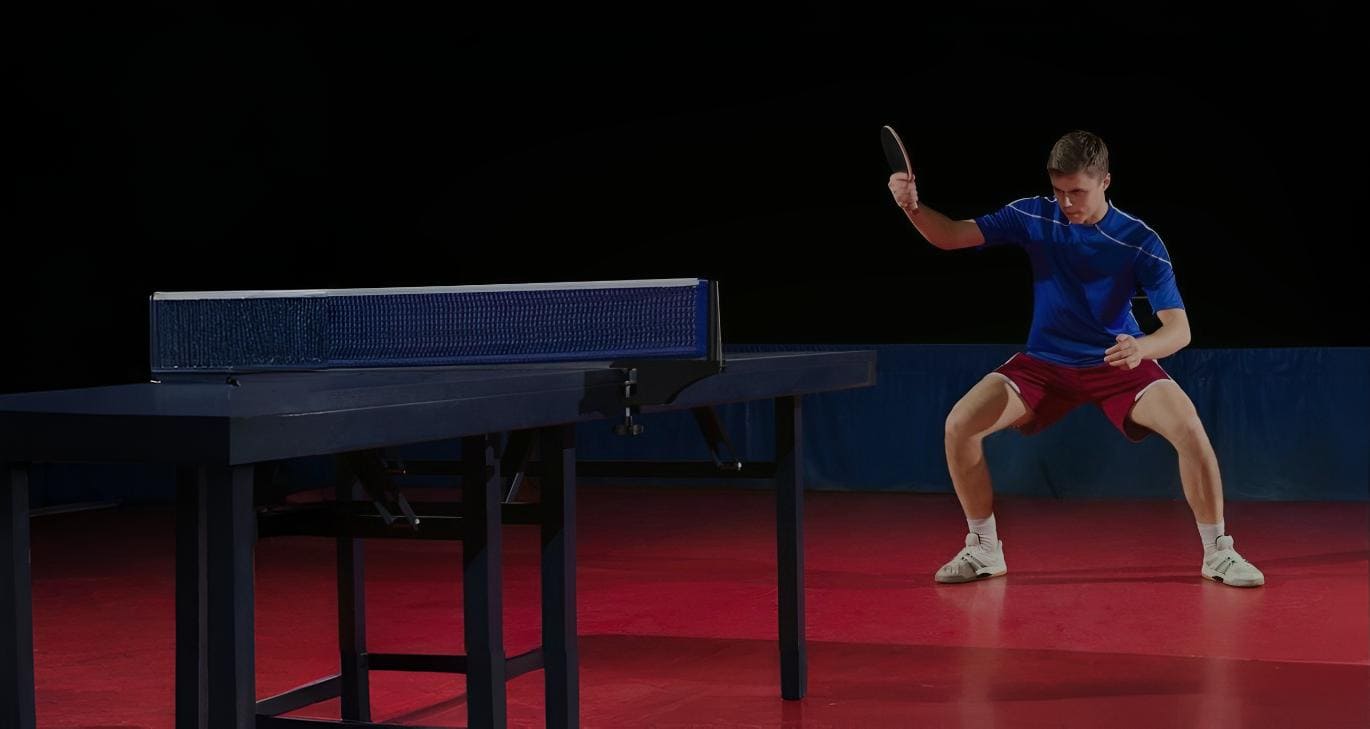 Table tennis player in action at Club Esportiu Joventut, Sant Josep de sa Talaia